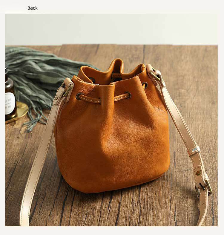 植鞣皮斜背包 頭層牛皮純色手工擦色肩背包 復古真皮水桶包 新款多用途大容量女單肩包推薦 真皮包包