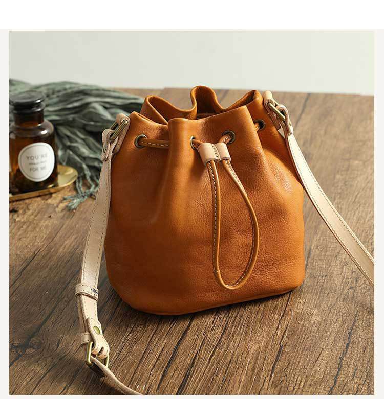 植鞣皮斜背包 頭層牛皮純色手工擦色肩背包 復古真皮水桶包 新款多用途大容量女單肩包推薦 真皮包包